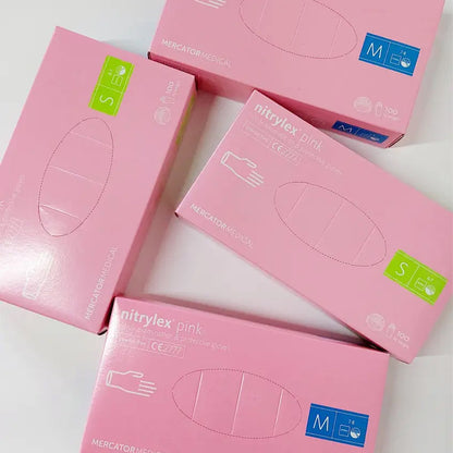 Рукавички нітрилові M, Nitrylex Pink, ніжно-рожеві, одноразові, неопудрені 100 шт.
